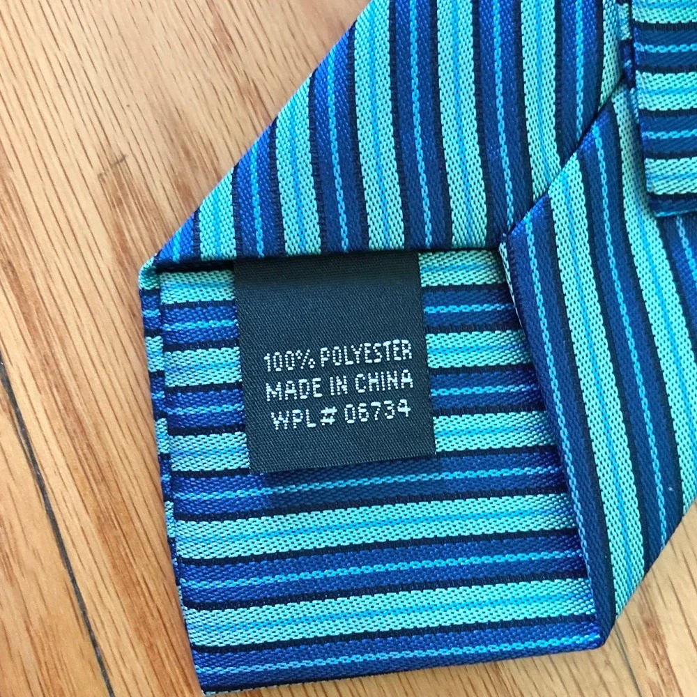 Boy’s blue and green striped clip on tie